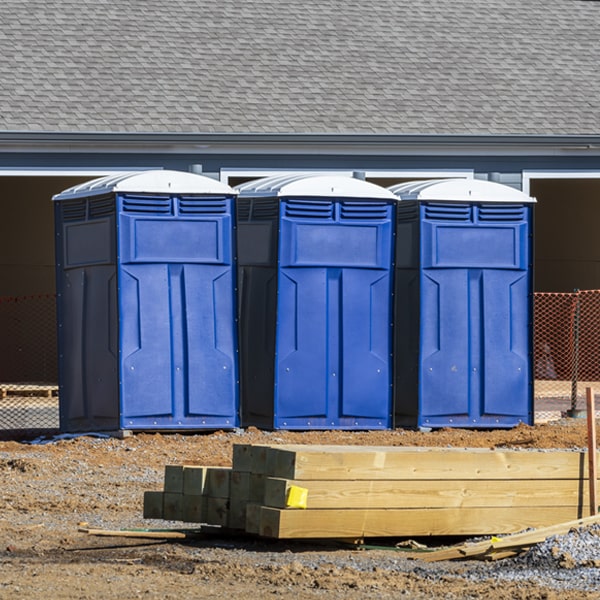 how often are the portable restrooms cleaned and serviced during a rental period in Boston MI